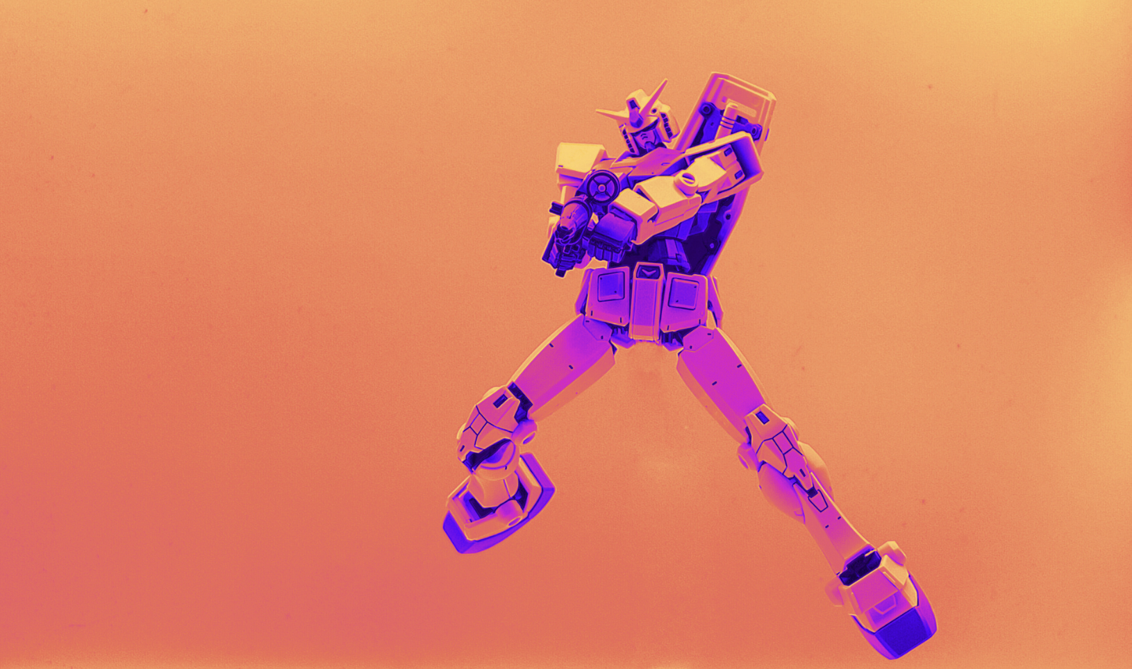 pink and blue robot on an orange background